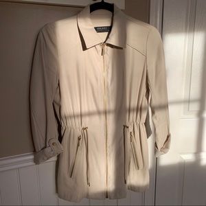 Gorgeous nude light jacket with gold hardware